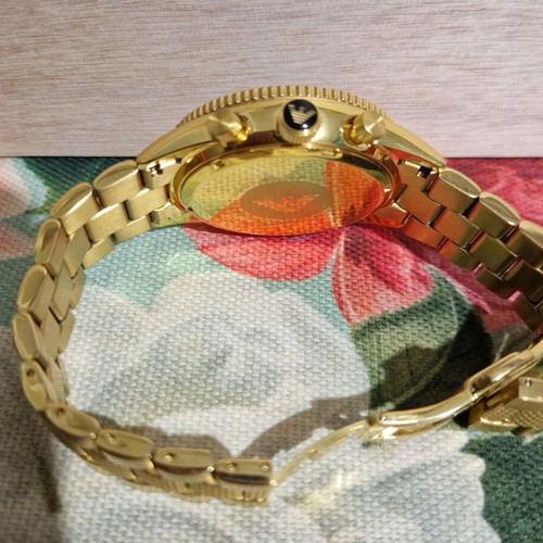 Emporio Armani men's watch in gold color like new
