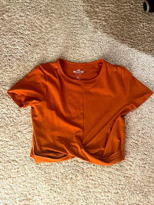 Hollister orange crop top with knot, size M, like new