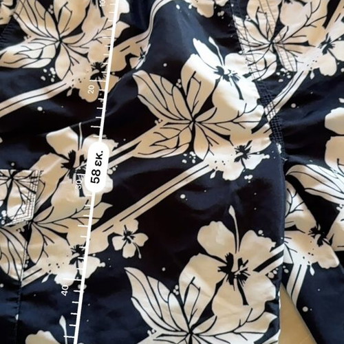 Crivit men's swim shorts XL used, blue and white floral