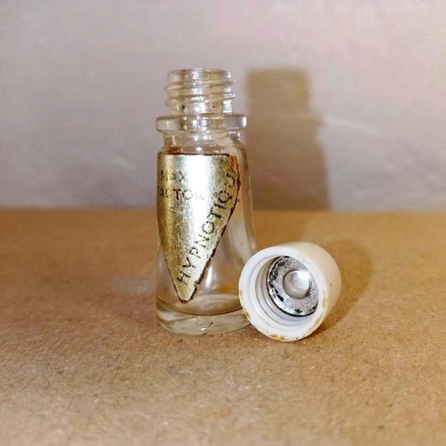 Hypnotique miniature bottle by Max Factor used, collectible