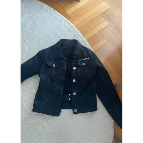 Short black reversible jacket with faux fur cuffs