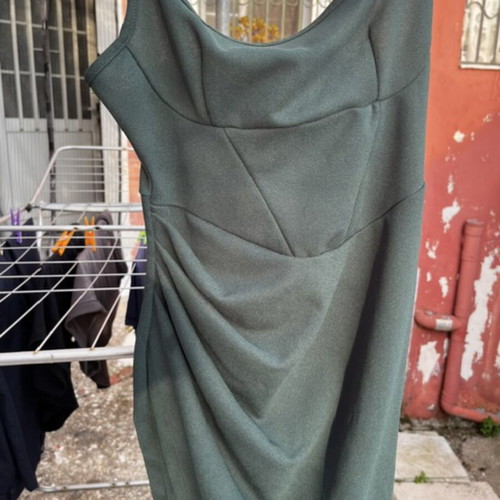Dress green, like new, adjustable straps, side slit