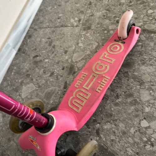 Micro Mini Deluxe Led scooter used with helmet for ages 2-5