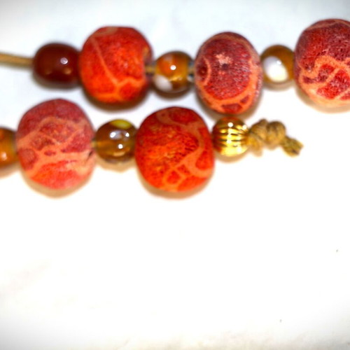 Begleri with genuine coral and 22K gold-plated beads, handmade by Indico Jewells