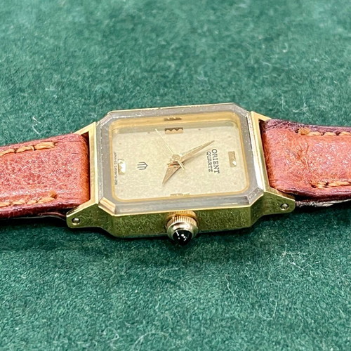 Orient wristwatch like new, beige and gold, Japan made