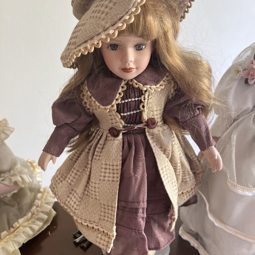 Porcelain doll with hat, 40 cm
