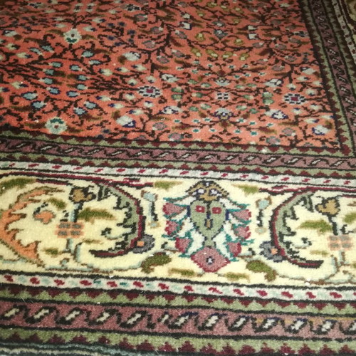 Handmade silk rug used with classic design and warm colors