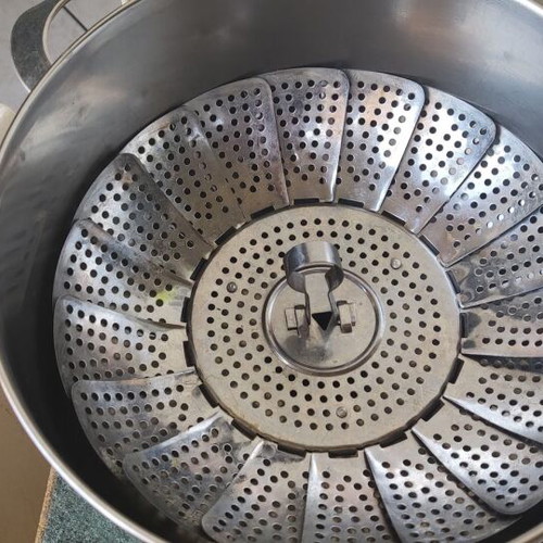 Cookware set used with pot, steamer, sieve, and colander