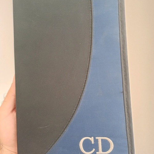 Fabric portable CD case used, 24 slots