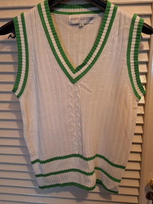White sleeveless knit sweater with green trims like new