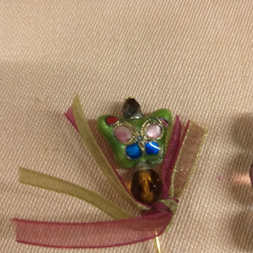 Lapel pins used, two small with enameled detail