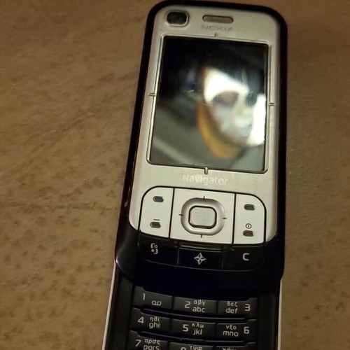 Nokia mobile phone used, silver, camera up to 7.9 MPixel