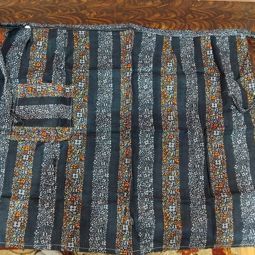 Apron new with stripes and floral motifs made of basma fabric