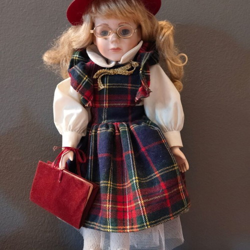 Porcelain doll used in music teacher role