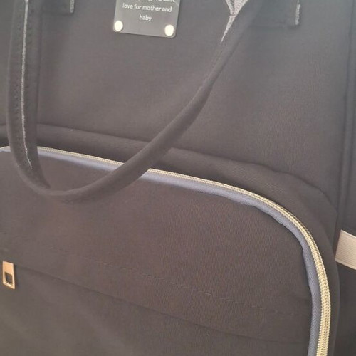 Lequeen Backpack Diaper Bag Black like new with changing mat and bottle warmer