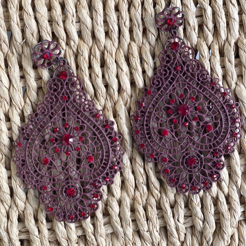 Long burgundy earrings used with color wear