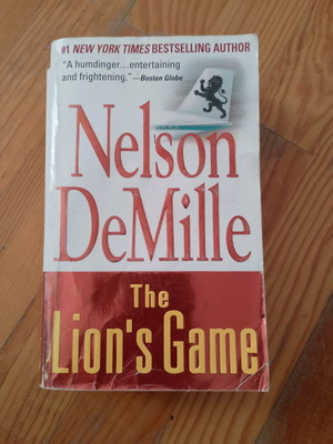 The Lion's Game by Nelson DeMille, paperback thriller