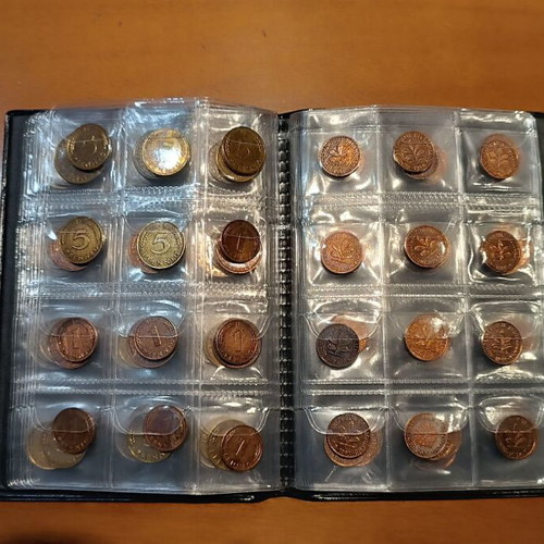 Album of 120 collectible coins from 7 countries
