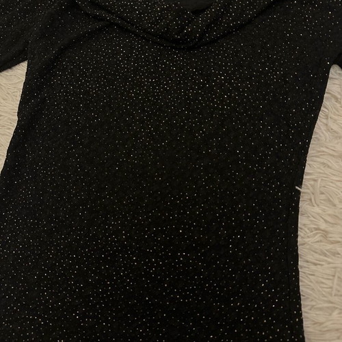Blouse with lace and gold rhinestone details used, black