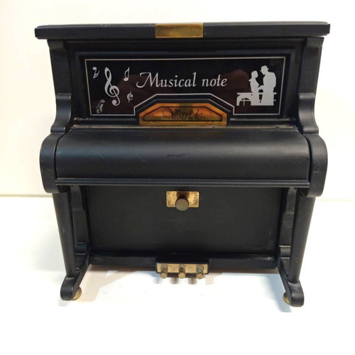 Decorative piano music box used from the 1970s with jewelry storage