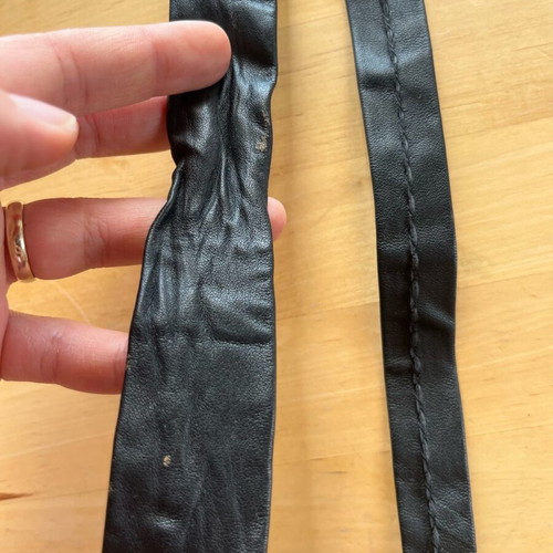 Leather black tie used with gray detail