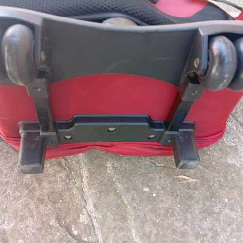 Rolling backpack 6 compartments like new, red