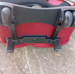 Rolling backpack 6 compartments like new, red