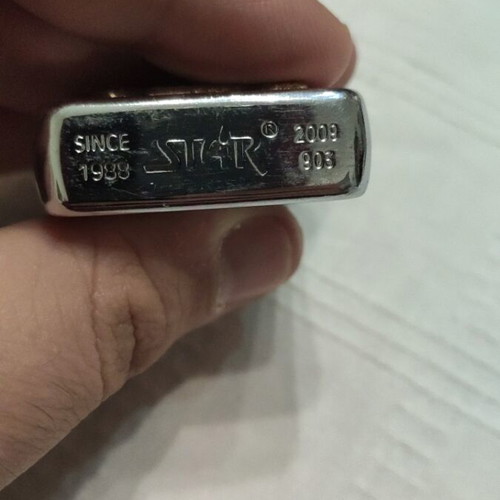 Star Tattooskull 13 lighter used, needs refill and new wicks