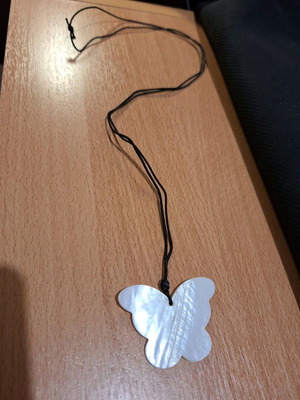 Butterfly pendant with adjustable cord