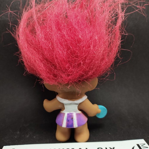 Troll Tennis Player figure with fuchsia hair and eyes