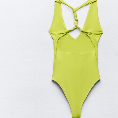 Lime bodysuit size S new with unique back design