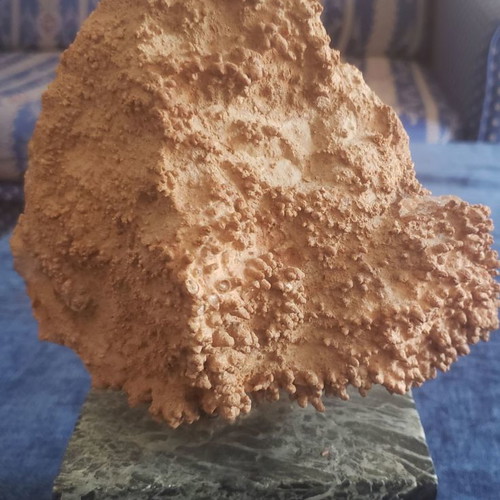 Natural raw mountain crystal used on large marble base