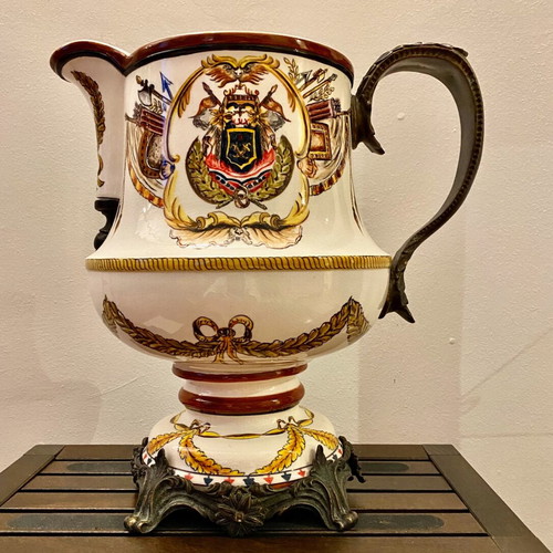 Decorative ceramic pitcher with brass fittings like new