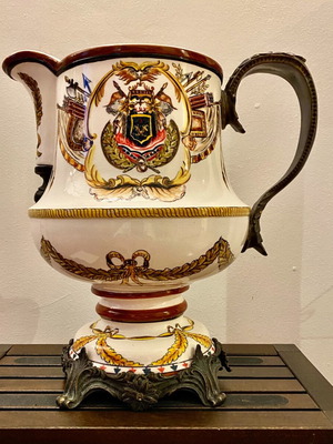 Decorative ceramic pitcher with brass fittings like new