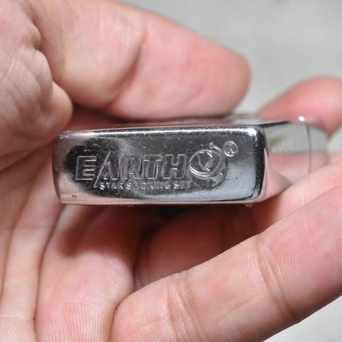 Earth vintage lighter used with Albanian theme