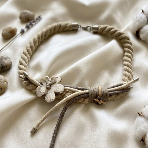 Handmade necklace in earth tones like new, beige