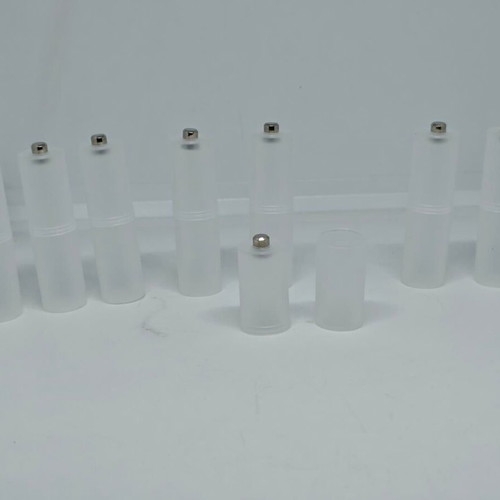 Battery adapters AA to C set of 8, like new, plastic transparent