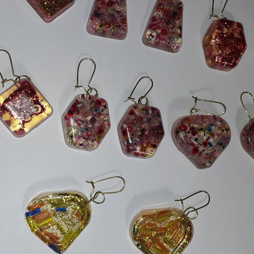Handmade earrings pack of 38 pairs with liquid glass material