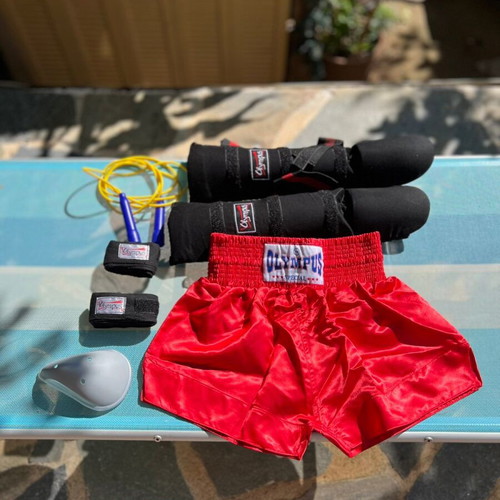 Kick Boxing Olympus set new with shin guards, shorts, wraps, groin guard and jump rope
