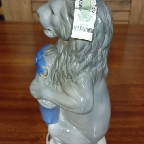 Traditional Ukrainian vodka in porcelain bottle with lion new