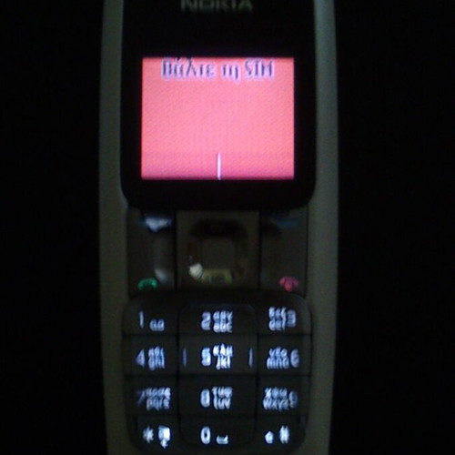 Nokia 2310 mobile phone with compatible battery