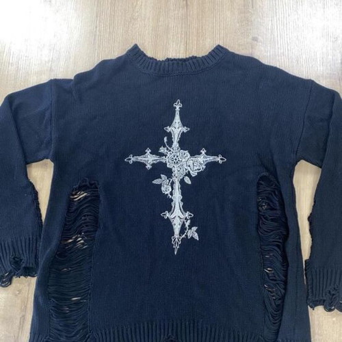 Black distressed sweater with white ornate cross graphic