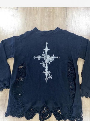 Black distressed sweater with white ornate cross graphic