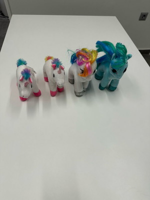 My Little Pony plush toys like new, set of 4 colorful ponies