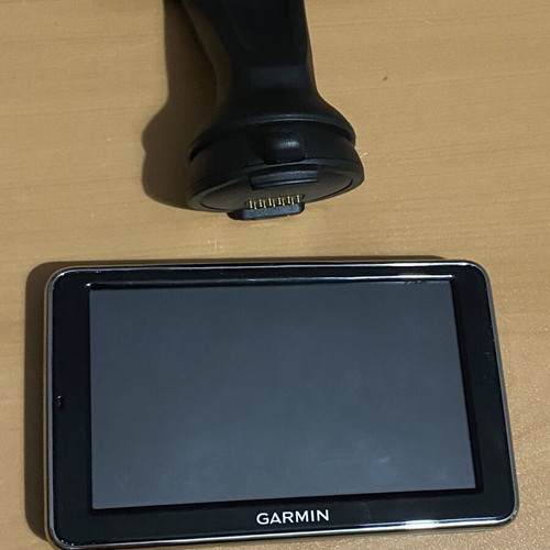 Garmin Move & Fun navigation screen with original dashboard mount like new