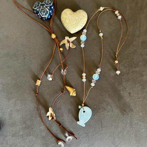 Fish necklace of very good quality and gift Necklace with leather decorations