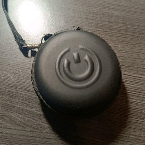Small round black case like new with clip
