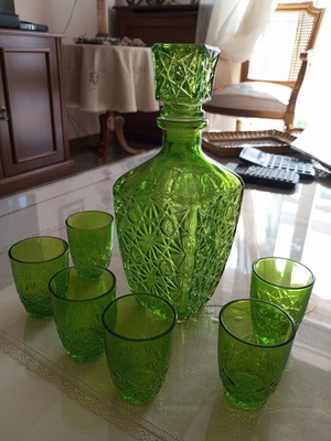 Liqueur bottle set with six green shot glasses like new