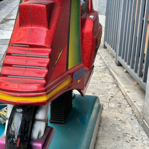 Coin-operated scooter used from the 90s, dimensions 74x106 cm