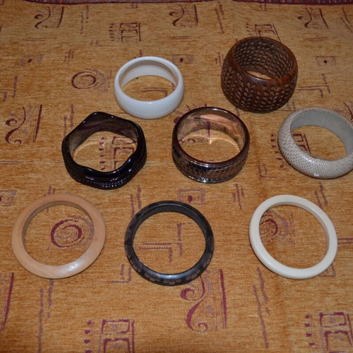 Various fixed bracelets used, multicolored, wood and plastic
